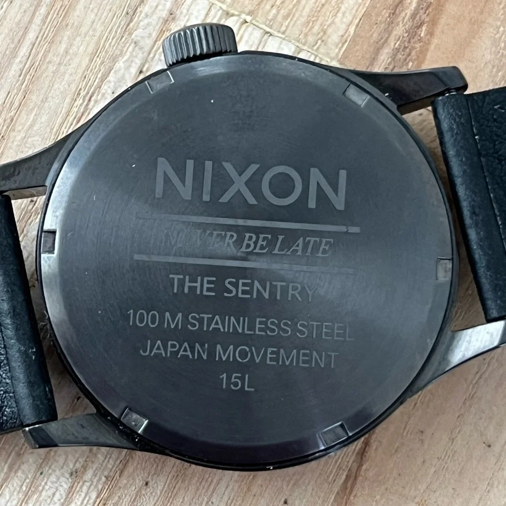 Nixon The Sentry Never Be Late Watch Black Green Dial Gunmetal Case Leather